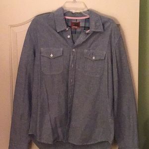Men’s chambray long sleeve bottom down. Perfect for spring